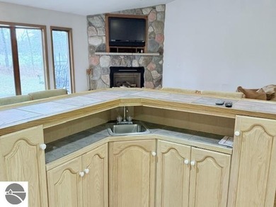 What a great house with an even better setting! This on Birch Pointe Golf Club in Michigan - for sale on GolfHomes.com, golf home, golf lot