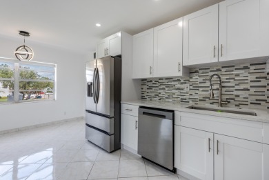 Experience refined living in this remodeled 1 bed, 1.5 bath on Kings Point Golf -Flanders Way in Florida - for sale on GolfHomes.com, golf home, golf lot