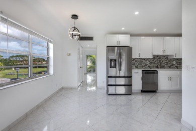 Experience refined living in this remodeled 1 bed, 1.5 bath on Kings Point Golf -Flanders Way in Florida - for sale on GolfHomes.com, golf home, golf lot