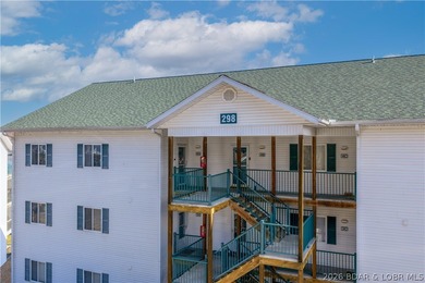 Experience lake living in this 4-bedroom, 2-bath penthouse on The Club At Old Kinderhook in Missouri - for sale on GolfHomes.com, golf home, golf lot
