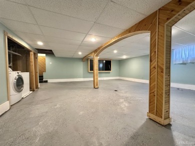 Welcome to this charming ranch home, beautifully updated and on Pine Grove Country Club in Michigan - for sale on GolfHomes.com, golf home, golf lot