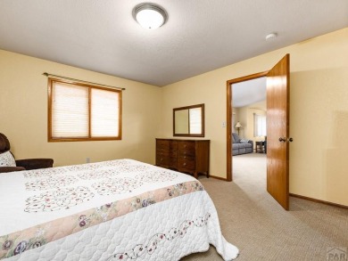 Discover your dream home in a serene cul-de-sac in Pueblo West on Desert Hawk At Pueblo West in Colorado - for sale on GolfHomes.com, golf home, golf lot