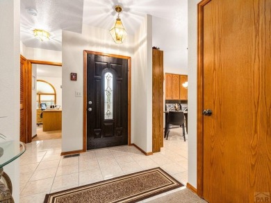 Discover your dream home in a serene cul-de-sac in Pueblo West on Desert Hawk At Pueblo West in Colorado - for sale on GolfHomes.com, golf home, golf lot