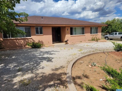 Tranquil Country Living with the convenience of being just on Silver City Golf Course in New Mexico - for sale on GolfHomes.com, golf home, golf lot