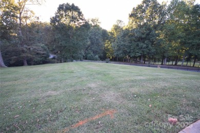This lot is located in an artfully designed full service on Rock Barn Golf and Spa in North Carolina - for sale on GolfHomes.com, golf home, golf lot