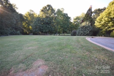 This lot is located in an artfully designed full service on Rock Barn Golf and Spa in North Carolina - for sale on GolfHomes.com, golf home, golf lot