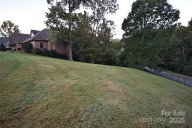This lot is located in an artfully designed full service on Rock Barn Golf and Spa in North Carolina - for sale on GolfHomes.com, golf home, golf lot