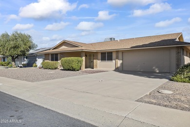 Welcome to this SPACIOUS 3-bedroom, 2-bath, 2-car garage home in on Sun City Lakes West and East in Arizona - for sale on GolfHomes.com, golf home, golf lot