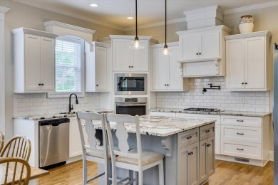Step into luxury with this stunning custom-built home in the on Bartram Trail Golf Club in Georgia - for sale on GolfHomes.com, golf home, golf lot