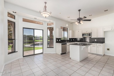 Custom single-level home located in a cul-de-sac on the golf on Red Mountain Ranch Country Club in Arizona - for sale on GolfHomes.com, golf home, golf lot