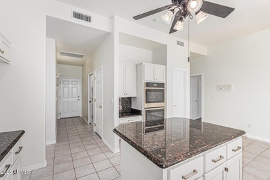 Custom single-level home located in a cul-de-sac on the golf on Red Mountain Ranch Country Club in Arizona - for sale on GolfHomes.com, golf home, golf lot