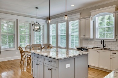 Step into luxury with this stunning custom-built home in the on Bartram Trail Golf Club in Georgia - for sale on GolfHomes.com, golf home, golf lot