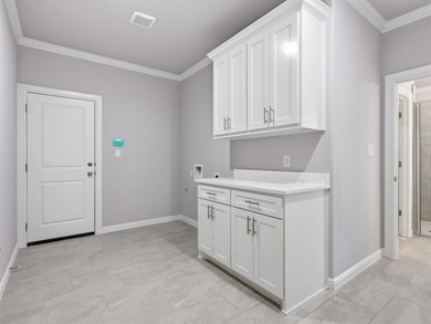 Welcome to this exceptional new build in the coveted, guarded on Pecan Plantation Country Club in Texas - for sale on GolfHomes.com, golf home, golf lot