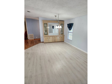 This spacious 2-bed/2-bath home with a den/family room situated on Spanish Lakes Fairways in Florida - for sale on GolfHomes.com, golf home, golf lot