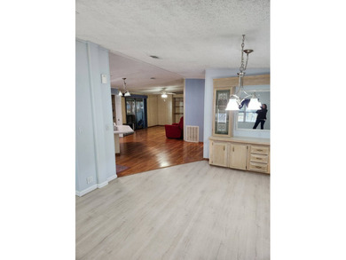 This spacious 2-bed/2-bath home with a den/family room situated on Spanish Lakes Fairways in Florida - for sale on GolfHomes.com, golf home, golf lot