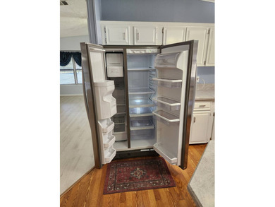 This spacious 2-bed/2-bath home with a den/family room situated on Spanish Lakes Fairways in Florida - for sale on GolfHomes.com, golf home, golf lot