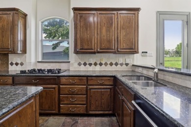 Put this custom home with a sparkling Pool and Spa at the top of on Buffalo Creek Golf Club in Texas - for sale on GolfHomes.com, golf home, golf lot