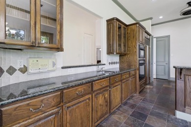 Put this custom home with a sparkling Pool and Spa at the top of on Buffalo Creek Golf Club in Texas - for sale on GolfHomes.com, golf home, golf lot