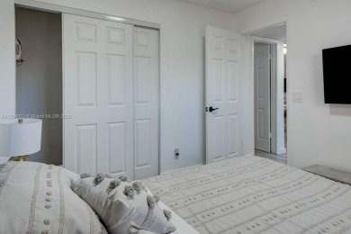 55+ COMMUNITY WITH A MAIN CLUBHOUSE, SAUNAS, BBQ, PICNIC AREAS on Sunrise Lakes Phase IV Golf Course in Florida - for sale on GolfHomes.com, golf home, golf lot