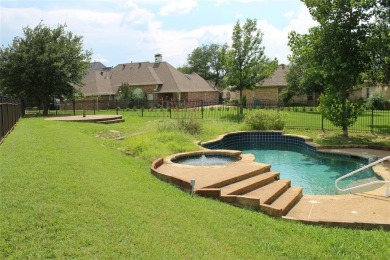 Put this custom home with a sparkling Pool and Spa at the top of on Buffalo Creek Golf Club in Texas - for sale on GolfHomes.com, golf home, golf lot