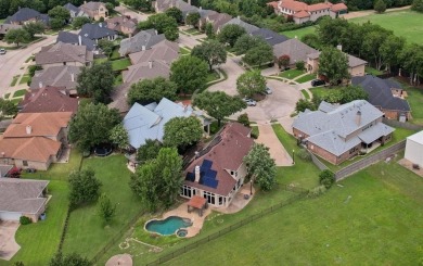 Put this custom home with a sparkling Pool and Spa at the top of on Buffalo Creek Golf Club in Texas - for sale on GolfHomes.com, golf home, golf lot