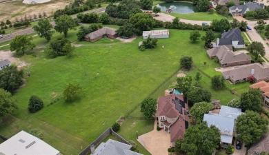 Put this custom home with a sparkling Pool and Spa at the top of on Buffalo Creek Golf Club in Texas - for sale on GolfHomes.com, golf home, golf lot