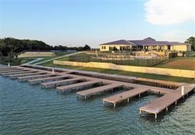 MOTIVATED SELLERS!!! This exquisite StoneField residence is on Heath Golf and Yacht Club in Texas - for sale on GolfHomes.com, golf home, golf lot