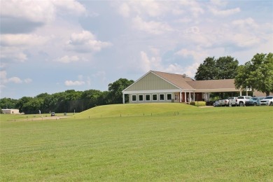 Put this custom home with a sparkling Pool and Spa at the top of on Buffalo Creek Golf Club in Texas - for sale on GolfHomes.com, golf home, golf lot