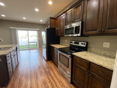 LOOKING FOR A LIKE NEW TOWNHOUSE IN COLUMBUS? LOOK NO FURTHER on Quail Run Golf Course in Nebraska - for sale on GolfHomes.com, golf home, golf lot