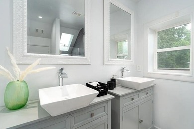 Modern design meets everyday comfort in this striking 3-bedroom on East Lake Golf Club in Georgia - for sale on GolfHomes.com, golf home, golf lot