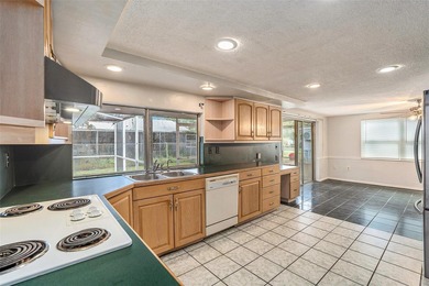 Under contract-accepting backup offers. One or more photo(s) has on Beacon Woods Golf Club in Florida - for sale on GolfHomes.com, golf home, golf lot