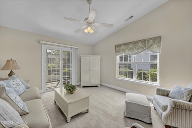 Welcome to 7809 Trap Way, a light-filled end-unit townhome in on Masonboro Country Club in North Carolina - for sale on GolfHomes.com, golf home, golf lot