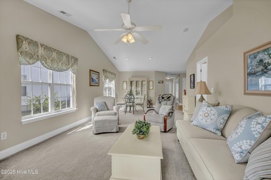 Welcome to 7809 Trap Way, a light-filled end-unit townhome in on Masonboro Country Club in North Carolina - for sale on GolfHomes.com, golf home, golf lot