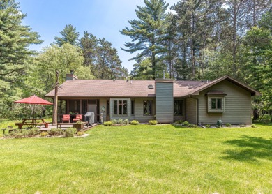 This immaculate and well cared for home offers views of the 14th on Timber Ridge Golf Club in Wisconsin - for sale on GolfHomes.com, golf home, golf lot