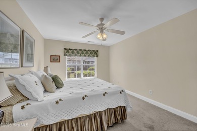 Welcome to 7809 Trap Way, a light-filled end-unit townhome in on Masonboro Country Club in North Carolina - for sale on GolfHomes.com, golf home, golf lot