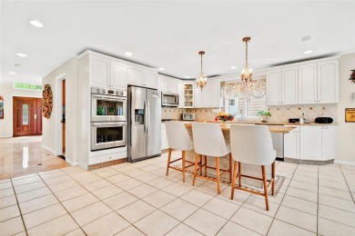 This elegant full-brick colonial sits on a prominent corner lot on Leewood Golf Club in New York - for sale on GolfHomes.com, golf home, golf lot