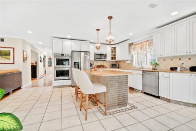 This elegant full-brick colonial sits on a prominent corner lot on Leewood Golf Club in New York - for sale on GolfHomes.com, golf home, golf lot