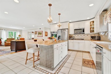 This elegant full-brick colonial sits on a prominent corner lot on Leewood Golf Club in New York - for sale on GolfHomes.com, golf home, golf lot