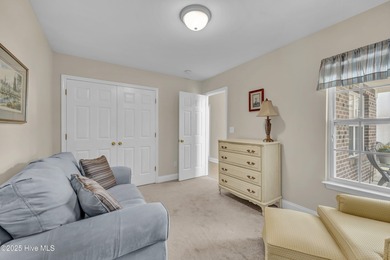 Welcome to 7809 Trap Way, a light-filled end-unit townhome in on Masonboro Country Club in North Carolina - for sale on GolfHomes.com, golf home, golf lot