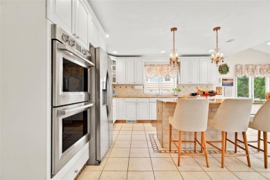 This elegant full-brick colonial sits on a prominent corner lot on Leewood Golf Club in New York - for sale on GolfHomes.com, golf home, golf lot