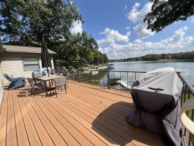 Discover your dream getaway on All Sports Lake Mecosta, part of on St. Ives Golf Club in Michigan - for sale on GolfHomes.com, golf home, golf lot