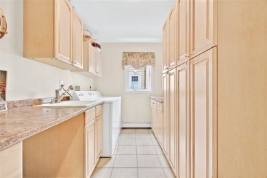 This elegant full-brick colonial sits on a prominent corner lot on Leewood Golf Club in New York - for sale on GolfHomes.com, golf home, golf lot