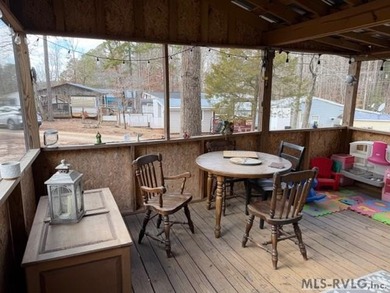 So much here for a great price! A living room and a bedroom are on River Ridge Golf Club in Virginia - for sale on GolfHomes.com, golf home, golf lot