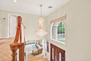 This elegant full-brick colonial sits on a prominent corner lot on Leewood Golf Club in New York - for sale on GolfHomes.com, golf home, golf lot