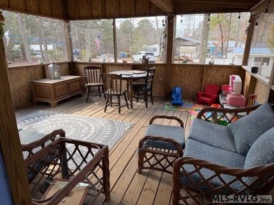 So much here for a great price! A living room and a bedroom are on River Ridge Golf Club in Virginia - for sale on GolfHomes.com, golf home, golf lot