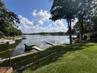 Discover your dream getaway on All Sports Lake Mecosta, part of on St. Ives Golf Club in Michigan - for sale on GolfHomes.com, golf home, golf lot