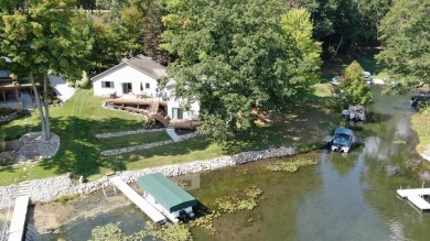 Discover your dream getaway on All Sports Lake Mecosta, part of on St. Ives Golf Club in Michigan - for sale on GolfHomes.com, golf home, golf lot