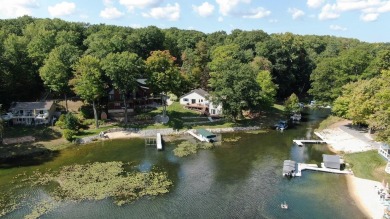 Discover your dream getaway on All Sports Lake Mecosta, part of on St. Ives Golf Club in Michigan - for sale on GolfHomes.com, golf home, golf lot