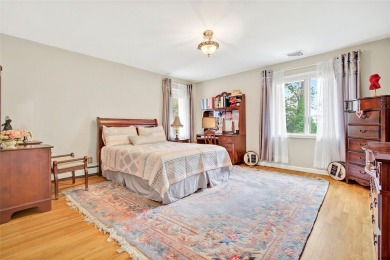 This elegant full-brick colonial sits on a prominent corner lot on Leewood Golf Club in New York - for sale on GolfHomes.com, golf home, golf lot