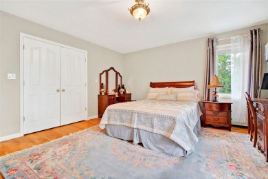 This elegant full-brick colonial sits on a prominent corner lot on Leewood Golf Club in New York - for sale on GolfHomes.com, golf home, golf lot